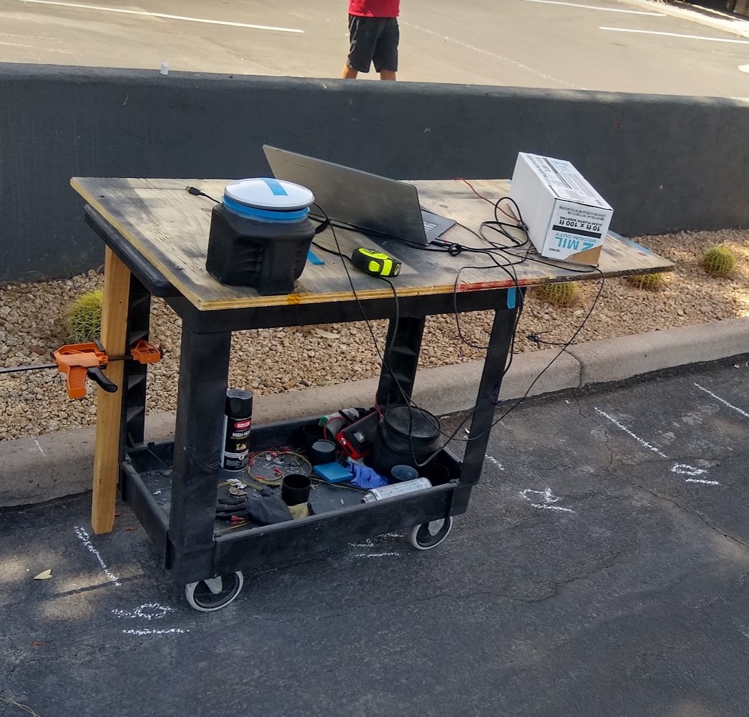 GPS system first prototype testing at the parking lot. Cardboard box protects electronics from 110F heat